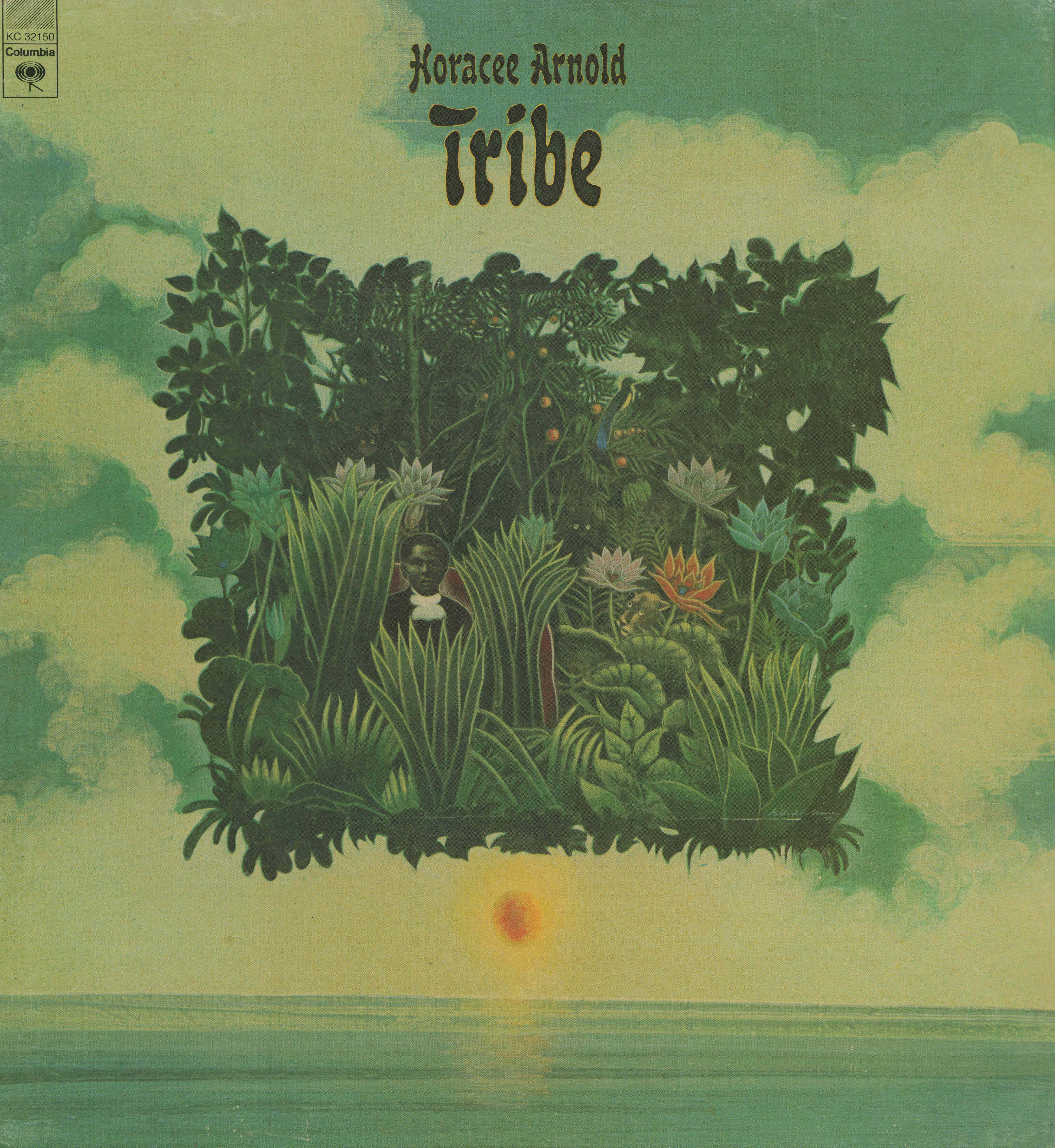 Man in jungle foliage suspended over ocean